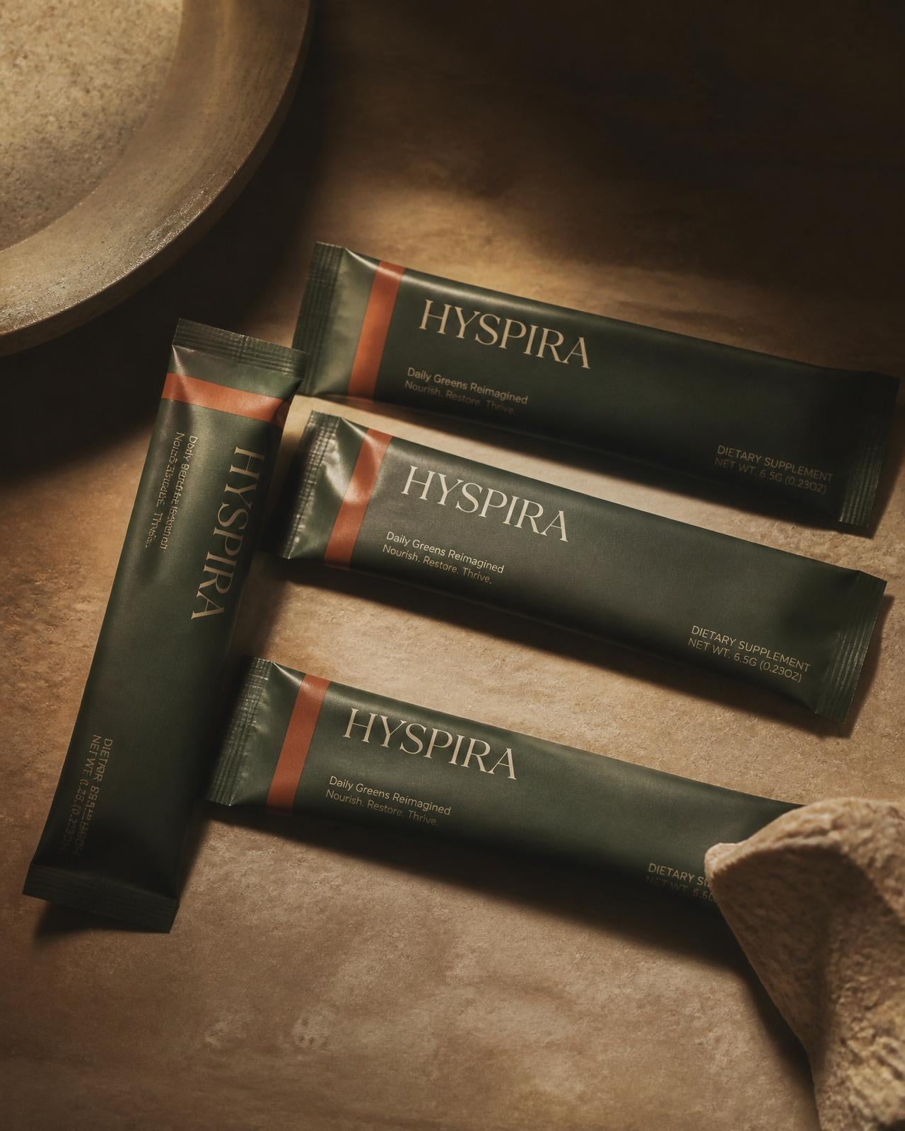 Hyspira daily protocol bottle in warm amber glass